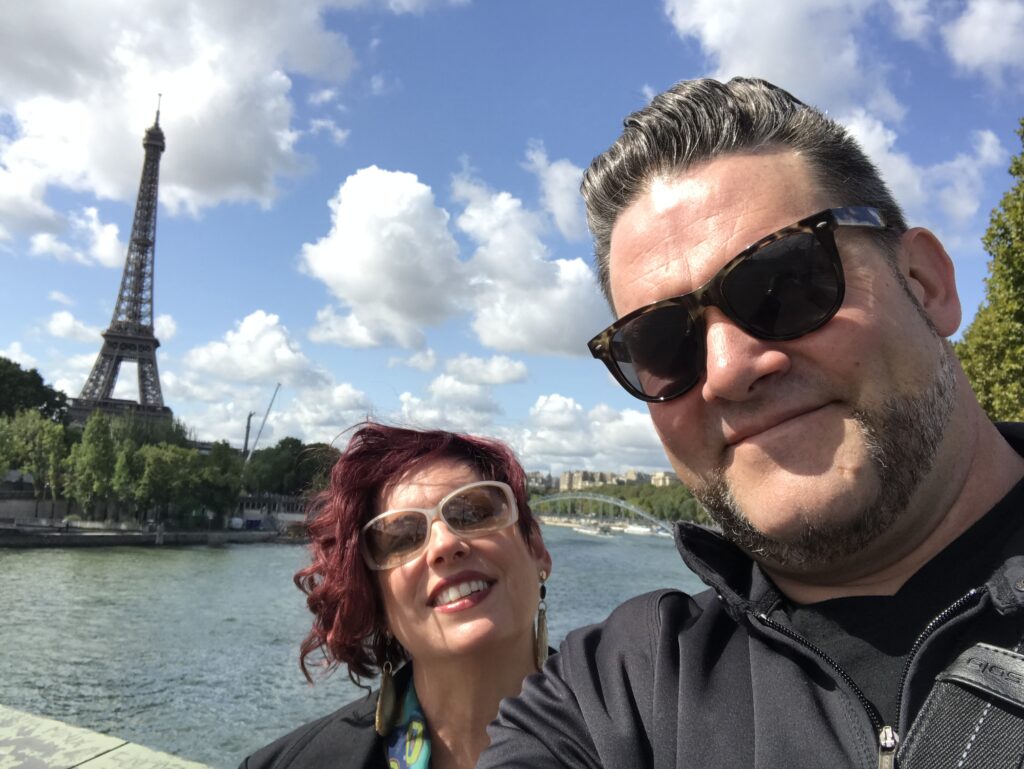 Laura Lafata and Felix Pike enjoy Paris with the Eiffel Tower in the backgroun