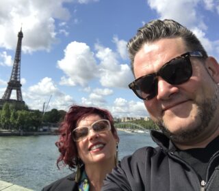 Laura Lafata and Felix Pike enjoy Paris with the Eiffel Tower in the backgroun
